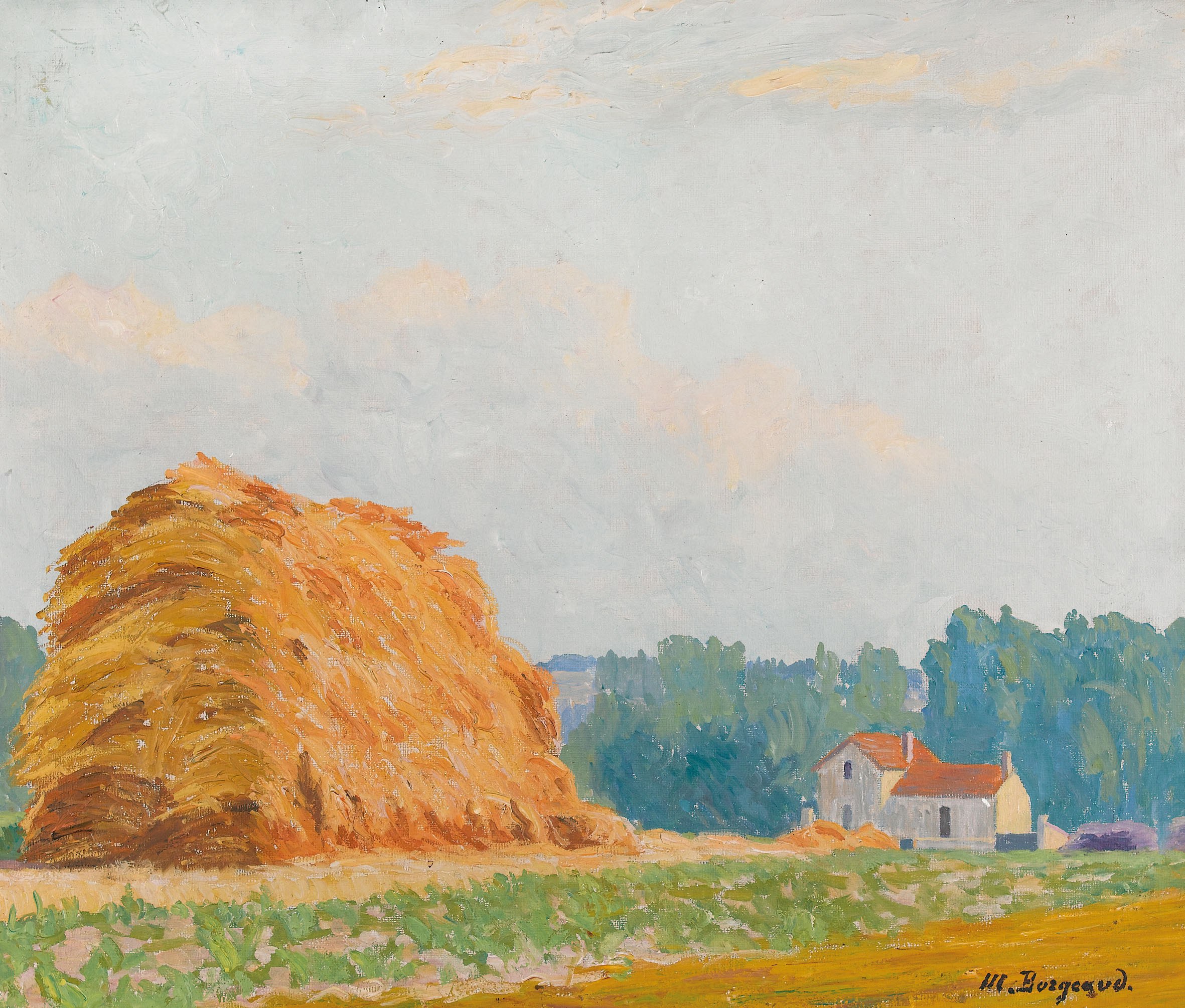 Meule de paille et maison